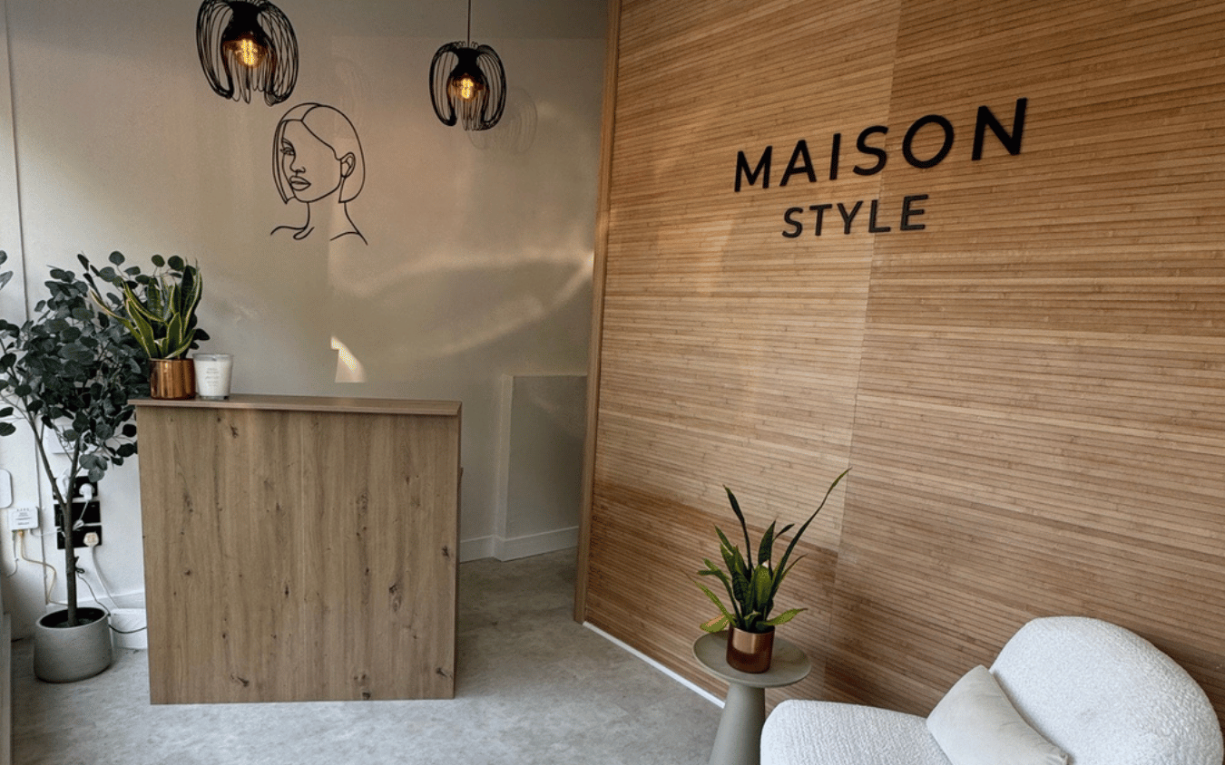Salon interior / stylist with client